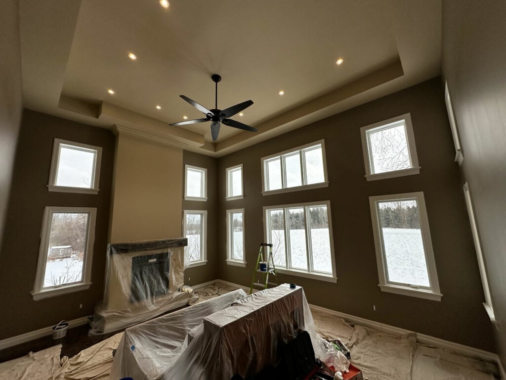 Atrium with dark walls and ceiling and lots of windows.