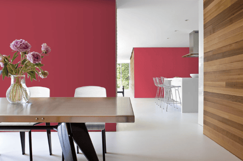 Elegant dining room with walls painted in Dulux DLX1187-7 Red Licorice